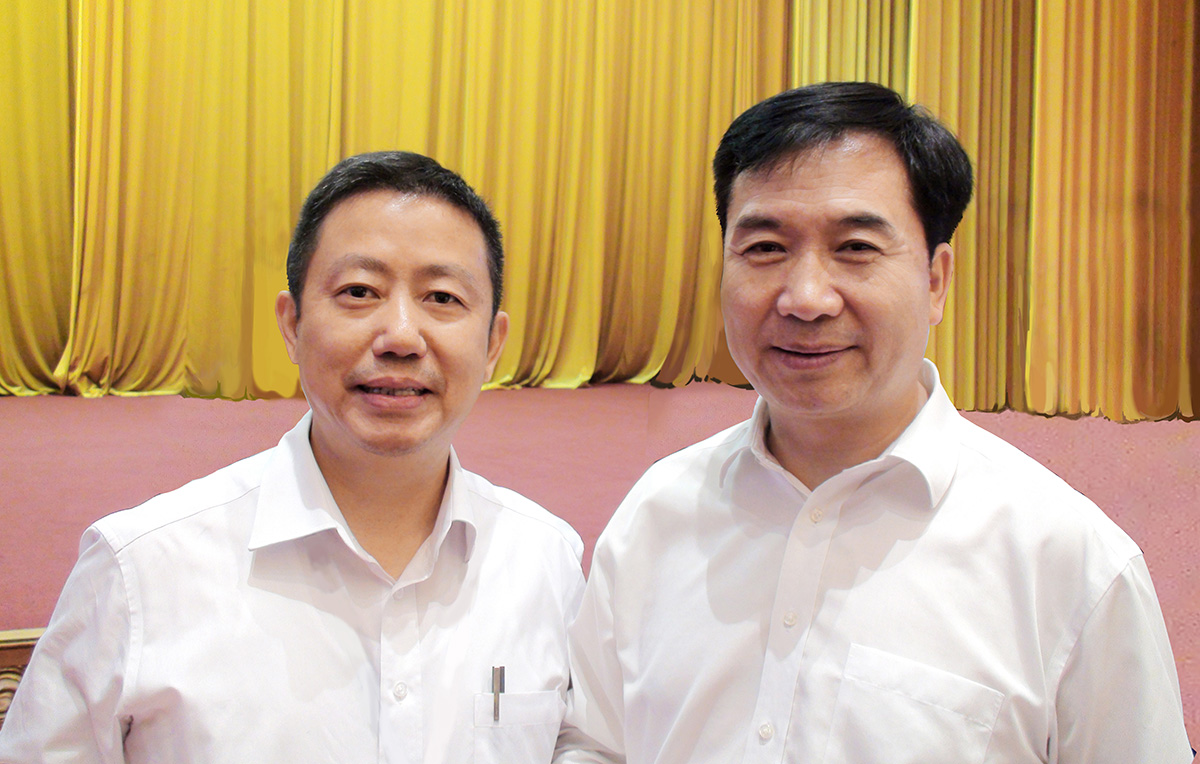 中央政治局常委、中央紀(jì)律檢查委員會書記李希與周海江合影